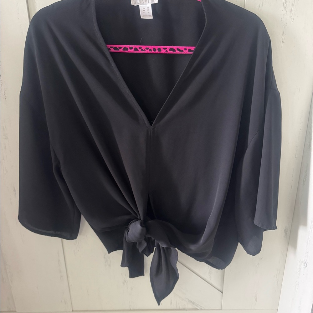 Chic Black Blouse with Elegant Design